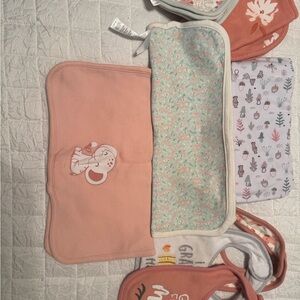 19 Newborn items Pink  Bibs onesies and sleepers. See photos. NWOT